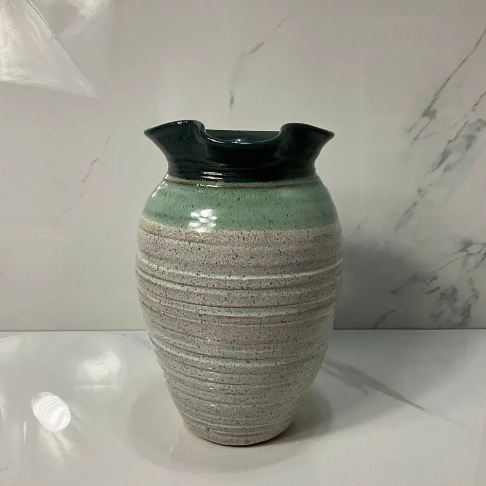 Handmade pottery pitcher